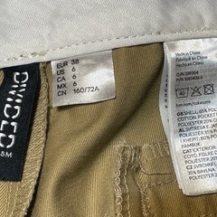 H&M キャメル パンツ ストレートパンツ の画像