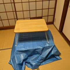 コンロ置くラックと折りたたみテーブルの画像