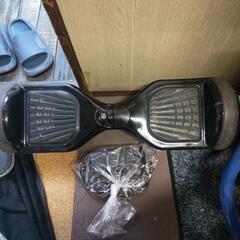 セグウェイ充電器付きの画像