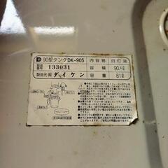 中古のボイラーと灯油タンクの画像