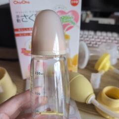chuchu　手動さく乳器　（2回使用　付属の哺乳瓶は未開封）の画像