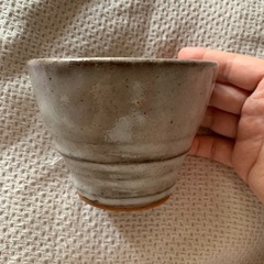 ハンドメイドのコーヒーカップとお皿のセットの画像