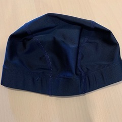 プールバックとタオルの画像