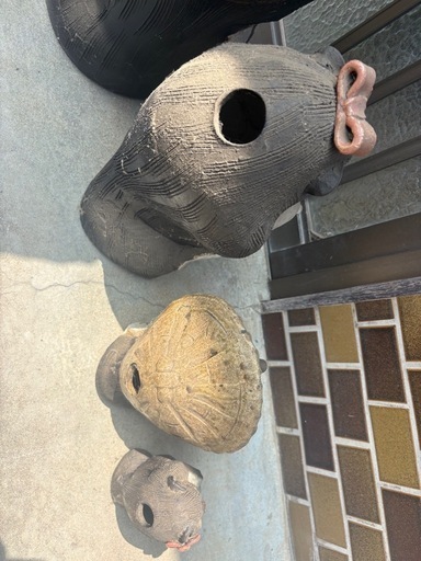 信楽焼のたぬき置物4体セットです。