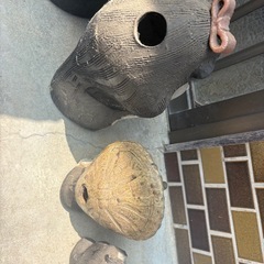 信楽焼のたぬき置物4体セットです。の画像