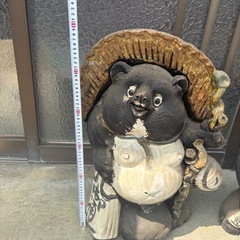 信楽焼のたぬき置物4体セットです。の画像