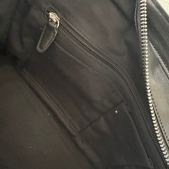 タッセル付きCOACHハンドバッグの画像