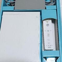 Wii本体＋コントローラーカバー＋ソフト4本　の画像