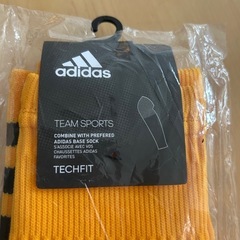 アディダスadidasサッカーソックスレッグウォーマー？黄色の画像