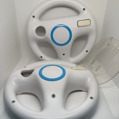 Wii本体+リモコン2+ヌンチャク1+マリオカートハンドル2+ソフト7本の画像