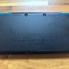 NINTENDO2DSLL本体　ブラック×ターコイズ　ソフト2本付きの画像
