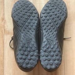 adidas サッカーシューズ 黒/オレンジの画像