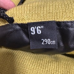 サーフボード入れと小物の画像