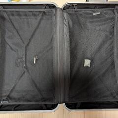 鍵付きスーツケース 105L 黄色の画像