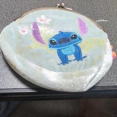 スティチの小銭入れとネコの絵の画像