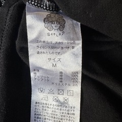 sclar    黒の半袖の画像