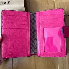 COACH二つ折り財布の画像