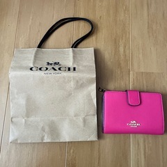 COACH二つ折り財布の画像