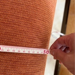20%オフ【値段交渉可】オレンジソファ(背もたれなし)の画像
