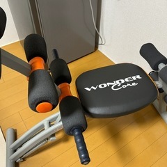 腹筋マシン、背中のストレッチの画像