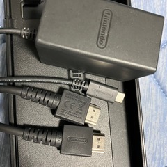 Switch本体とドッグと社外コントローラーの画像