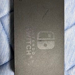 Switch本体とドッグと社外コントローラーの画像
