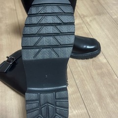 黒いハイブーツの画像