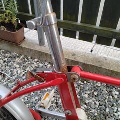 昭和レトロな折りたたみ自転車の画像