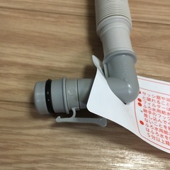 洗濯機に風呂の水を入れるホ-スの画像