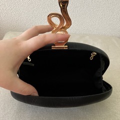 ヘビモチーフ　バッグの画像