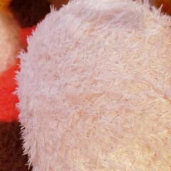 ミッキーマウスの特大ぬいぐるみの画像