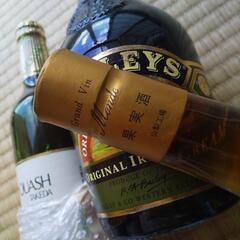 古酒の瓶が三本ですの画像