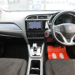 ホンダ　シャトル　ハイブリッド　ホンダセンシング★1年保証★ロードサービス付　社外ＳＤナビ　地デジ　バックカメラ　Ｂｌｕｅｔｏｏｔｈオーディオ　ＵＳＢ　アダプティブクルコン　スマートキー　プッシュスタート　オートエアコンの画像