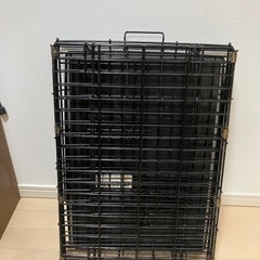 ペットケージ。折りたたみ式の画像