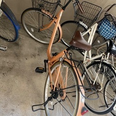 オレンジ　自転車の画像