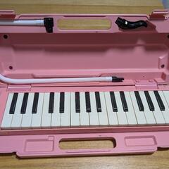 ピアニカ　鍵盤ハーモニカピンク奥の画像