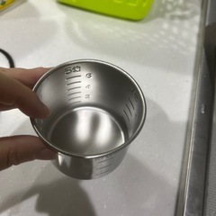 計量カップ　粥の画像
