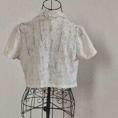 ベージュ　カーディガンの画像
