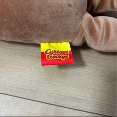 おさるのジョージのぬいぐるみの画像