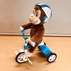 おさるのジョージ 走る三輪車付きぬいぐるみの画像