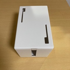 電源コード　収納ボックスの画像
