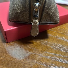 COACHのコスメポーチの画像
