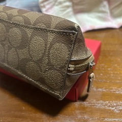 COACHのコスメポーチの画像