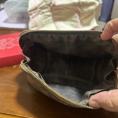 COACHのコスメポーチの画像