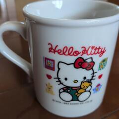 キッチンタイマーとコーヒーカップの画像