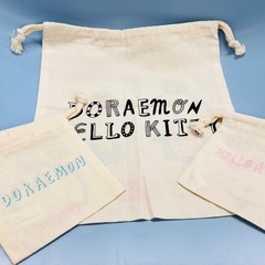ASOKO ドラえもん キティちゃん コラボ巾着 3点セットの画像