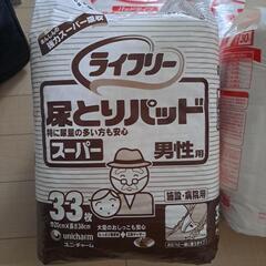 オムツのおまけあり　大人用パット未開封3袋+開封済み1袋の画像