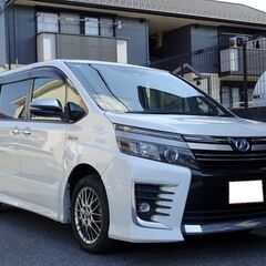 車検満タン ヴォクシー ハイブリッドZS 煌II トヨタセーフティセンス 衝突軽減ブレーキ ナビ フルセグTV Bluetooth フリップダウンモニター バックモニター 両側パワスラ スマートキー フルエアロ LEDライト LEDフォグ ETCの画像