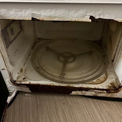 電子レンジと座椅子の画像