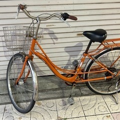 オレンジ ママチャリ 26インチ 変速あり　自転車の画像